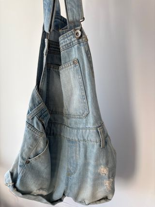 Peto vaquero corto desgastado
