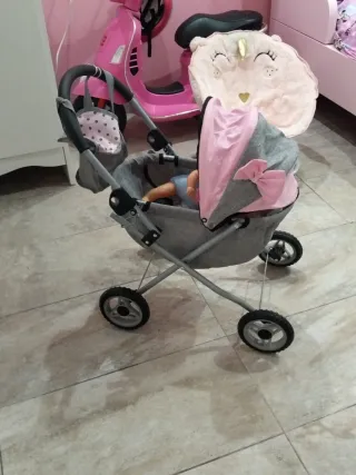 Carrito de muñecas gris y rosa