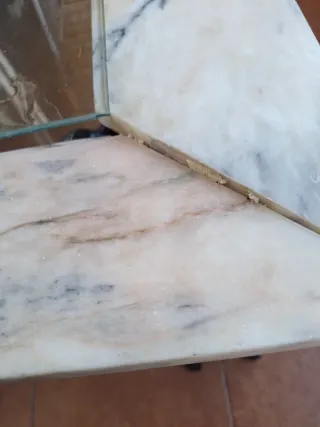 Mesa centro mármol y cristal, es para arreglar