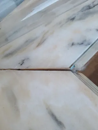 Mesa centro mármol y cristal, es para arreglar