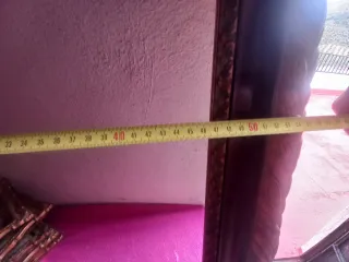 Marco de espejo dorado antiguo