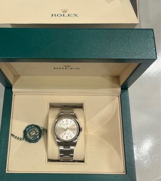 Rolex Oyster Perpetual 36mm esfera plateada