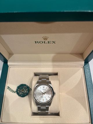 Rolex Oyster Perpetual 36mm esfera plateada