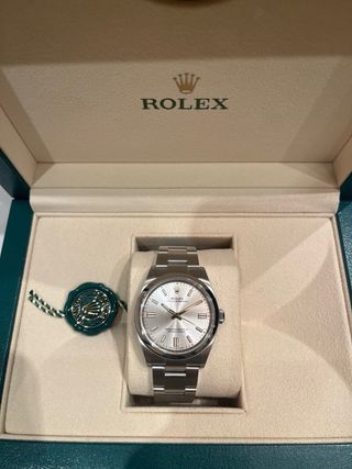 Rolex Oyster Perpetual 36mm esfera plateada