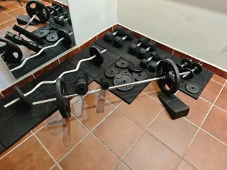 Juego de pesas y barra
