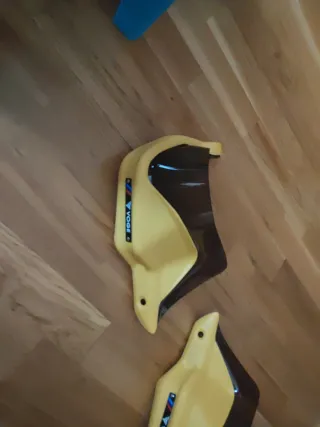 Guardamanos Voge Amarillo