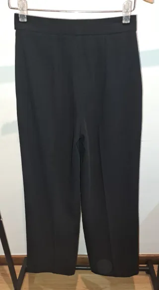 Pantalón Mango negro con raya lateral blanca