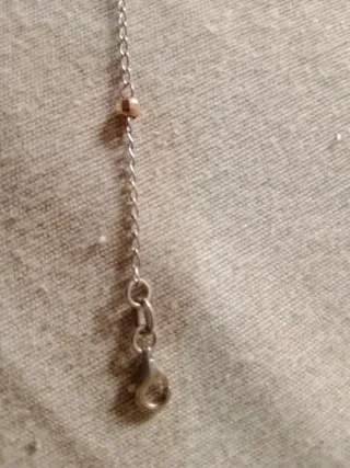 Bracciale con croce e perline