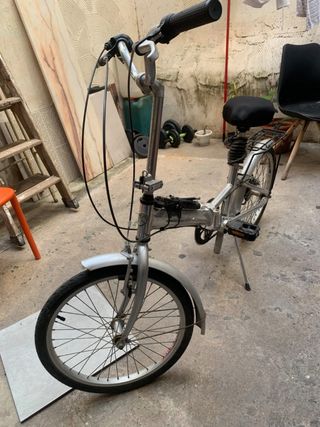 Bicicleta plegable aluminio con papeles