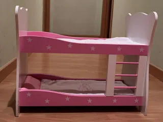 Cuna para muñecas rosa con estrellas