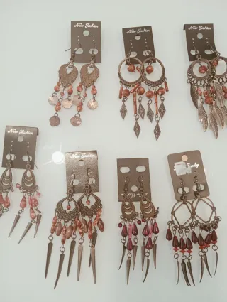 PackBisutería 26 pulseras,39pendientes y 2 anillos