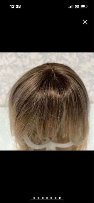 Vistosa peluca rubia a capas efecto natural