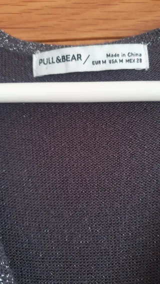 Mono de fiesta plateado talla M.