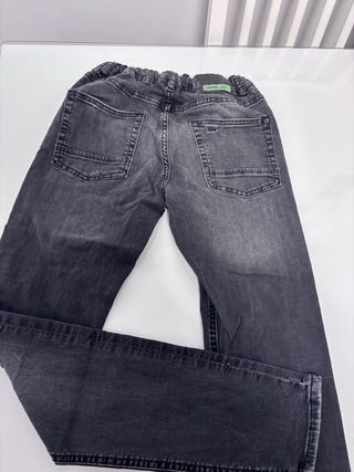 Pantalón vaquero gris roto 14 años