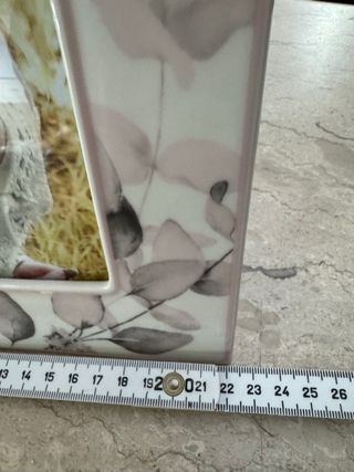 Cornice Hervit in porcellana decorata