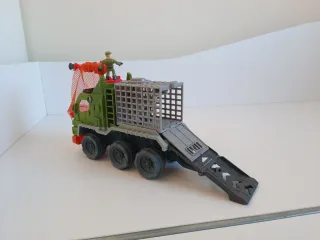 Camión Caza Dinosaurios con Figura