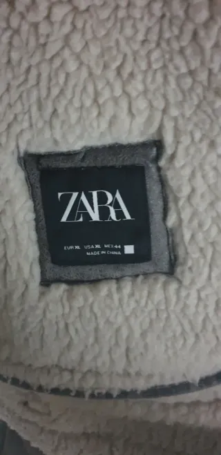 Cazadora efecto piel gris