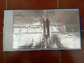 Álbumes para monedas y billetes