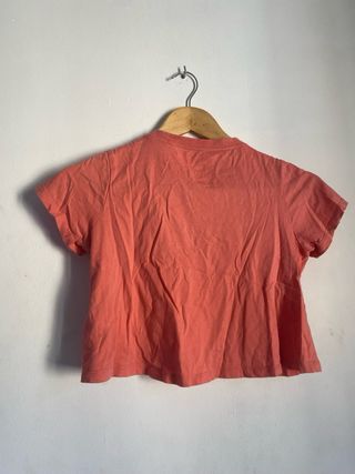 Camiseta Nike niña coral con logo