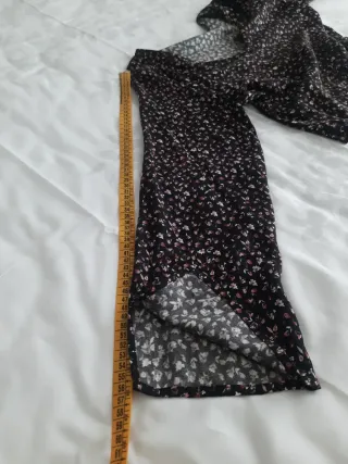 Blusa Noon. T.S. estampada manga acampanada