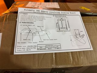 Tabla de planchar abatible bajo mueble