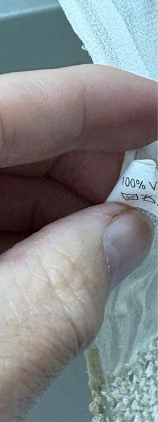 Fular color crema con flecos