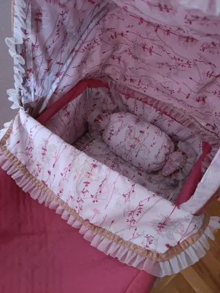 Carrito de muñecas juguete