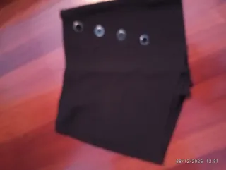 Falda pantalón negra con ojales