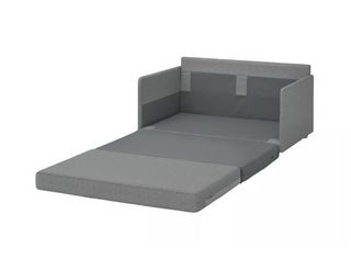 Sofá cama extensible gris como nuevo.