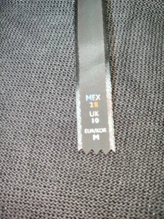 Blusa plateada brillante con lazo