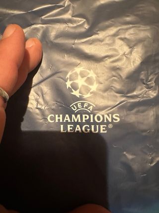 Cappellino e zainetto Champions League Heineken