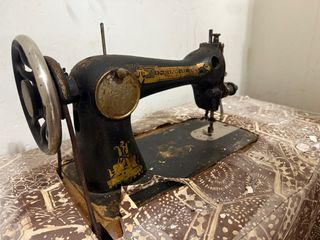 Máquina de coser Singer antigua pedal