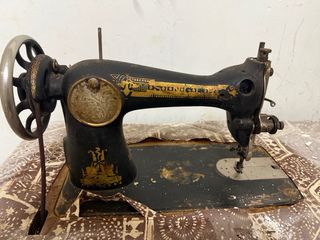 Máquina de coser Singer antigua pedal