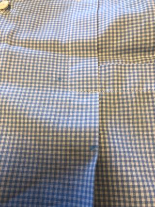 Grembiule asilo a quadretti azzurri con 2 macchie