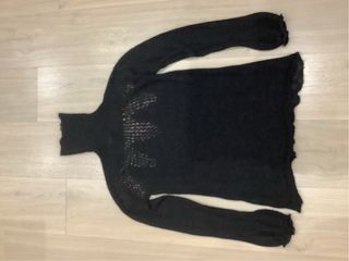 Jersey calado cuello alto negro