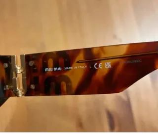 Gafas de sol Miu Miu Tortoise y Doradas