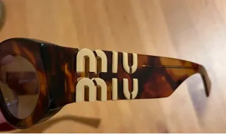 Gafas de sol Miu Miu Tortoise y Doradas