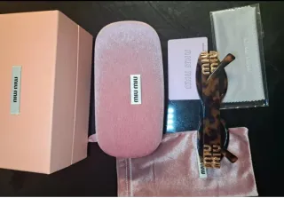 Gafas de sol Miu Miu Tortoise y Doradas