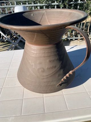 Grande conca antica in rame decorata