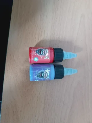 Tinta, aguja y mesclador de tinta para tatuadores