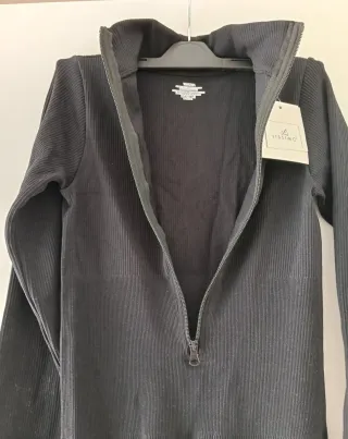 Macacão compressivo boca de sino preto