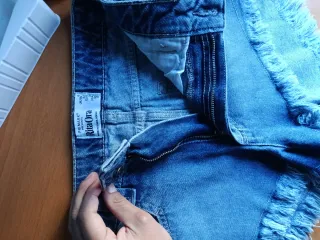 Shorts vaqueros con flecos