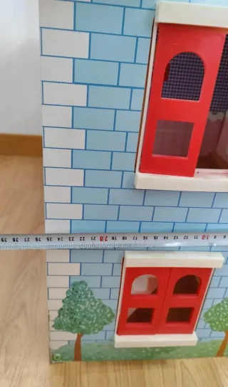 Casa de muñecas de madera