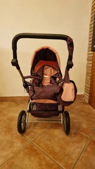 Carrozzina giocattolo per bambole