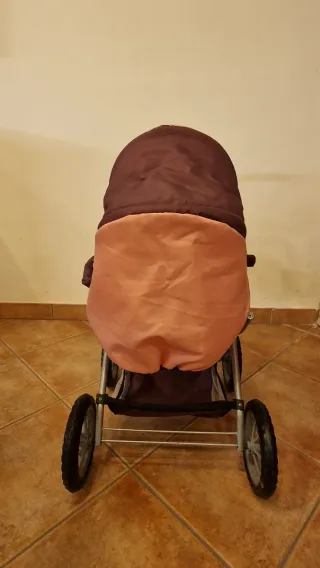 Carrozzina giocattolo per bambole