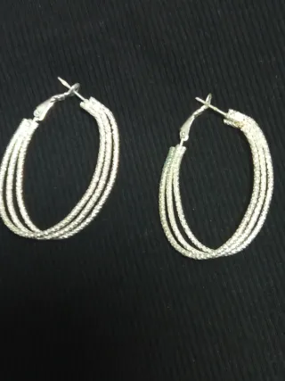 Pendientes largos ovalados plateados