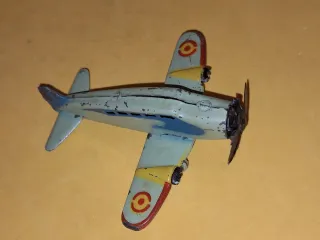 Avión de hojalata antiguo años 40