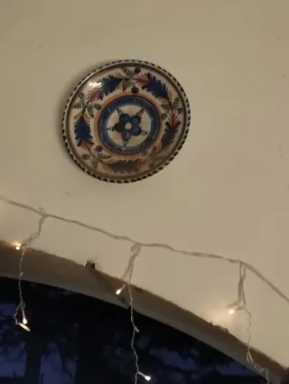 Plato decorativo antiguo pájaro