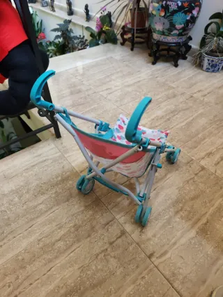 Carro de juguete para muñecas