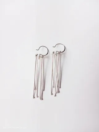 Pendientes largos hecho a mano en plata de ley